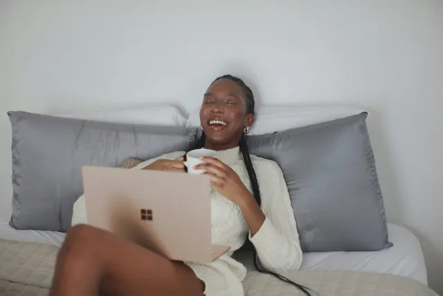 A client joining a virtual coaching session from home